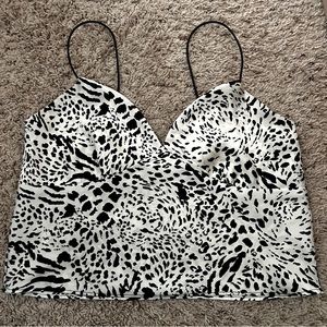Animal print black and white top. Size small. Not new but nothing wrong with it